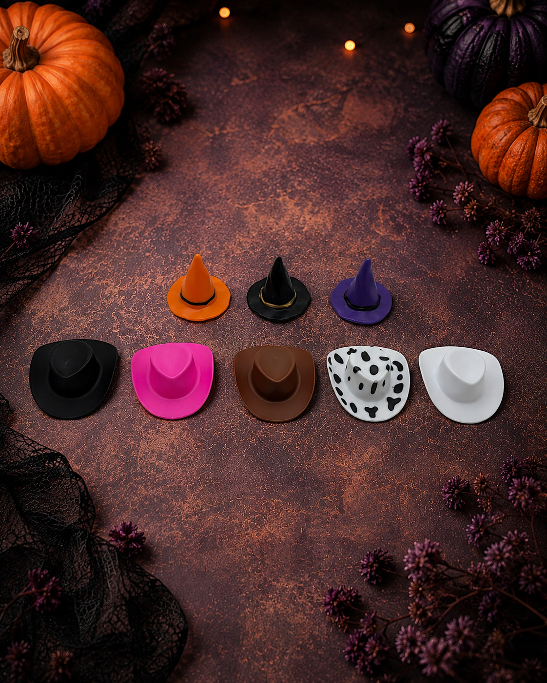 Eight decorative plastic hat options for Cute But Spooky candle