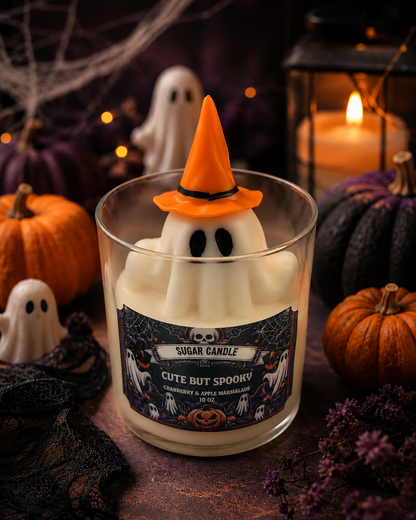 Cute But Spooky ghost candle with orange witch hat